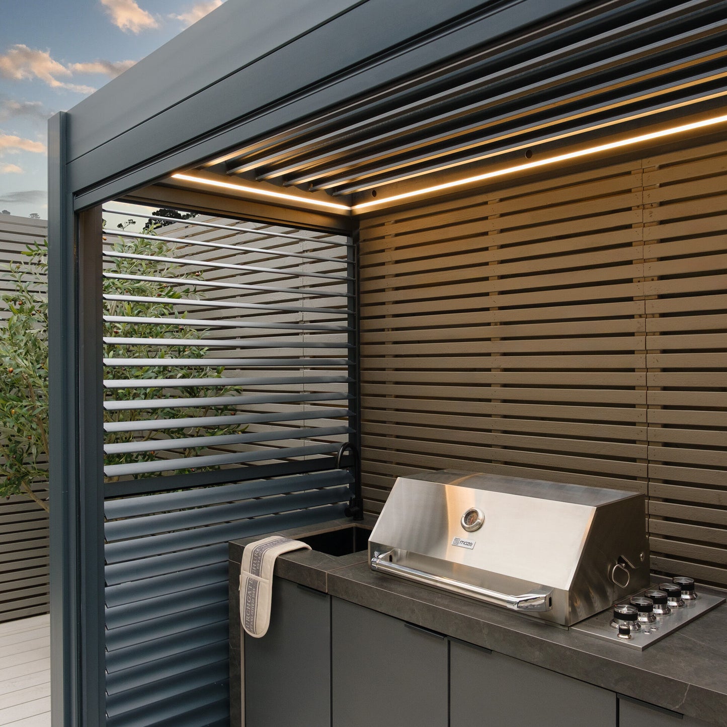 Grill King Outdoor BBQ Shelter Package – 6 Burner Charcoal BBQ Kitchen, Fridge & Sink + Freestanding Aluminium Louver Roof with LED Lighting & Privacy Blind