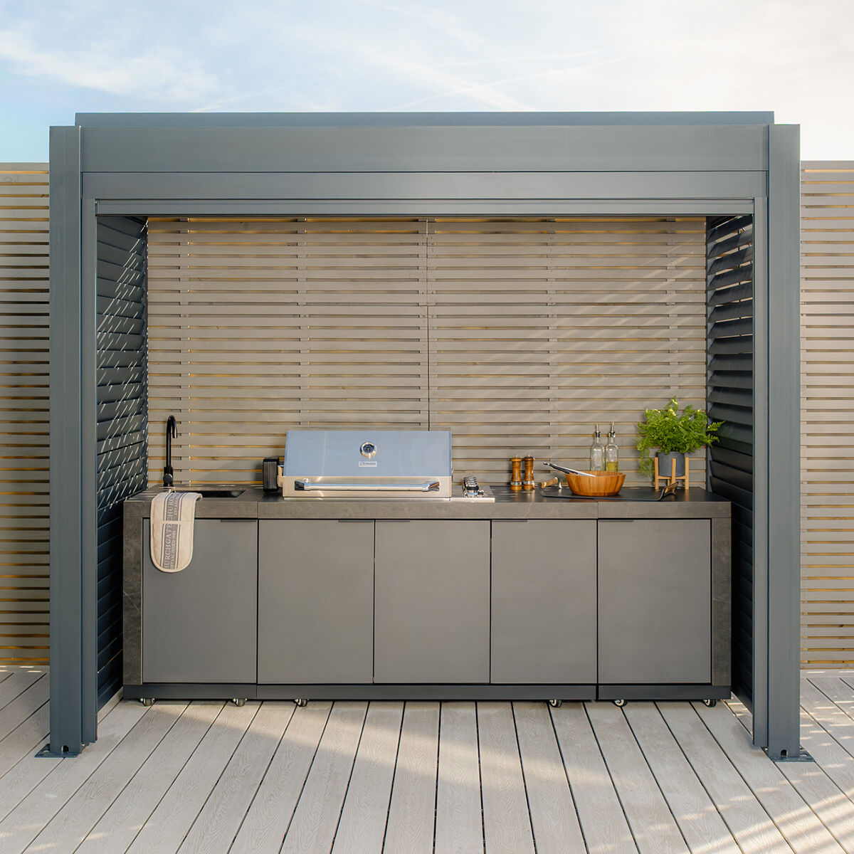 Grill King Outdoor BBQ Shelter Package – 6 Burner Charcoal BBQ Kitchen, Fridge & Sink + Freestanding Aluminium Louver Roof with LED Lighting & Privacy Blind