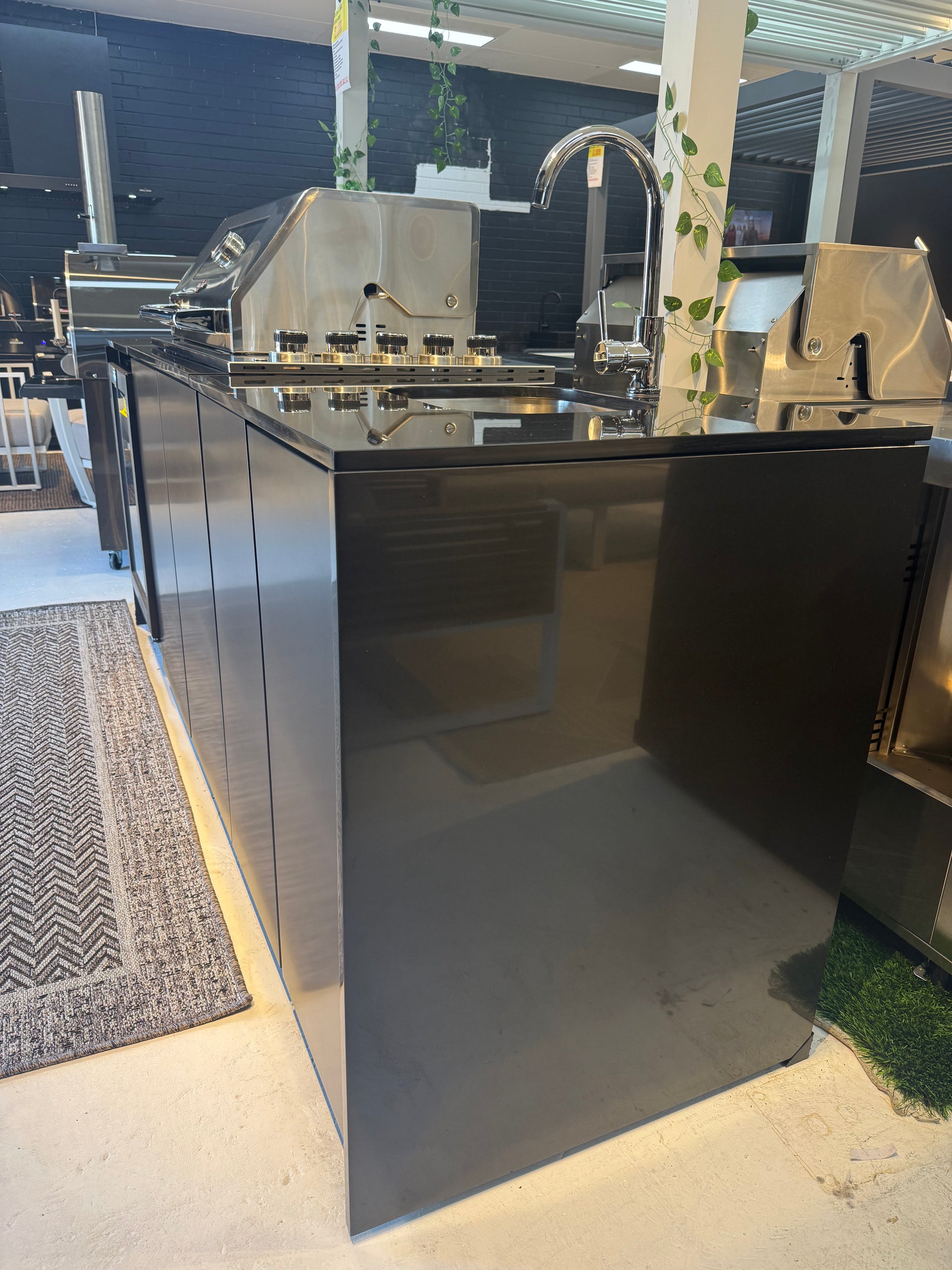 Grill King Signature Series Outdoor BBQ Kitchen Package – Rockpool Black Stone Bench-Top, Black Aluminium Cabinets | 4-Burner Built-In BBQ + Rotisserie + 150L Outdoor Fridge