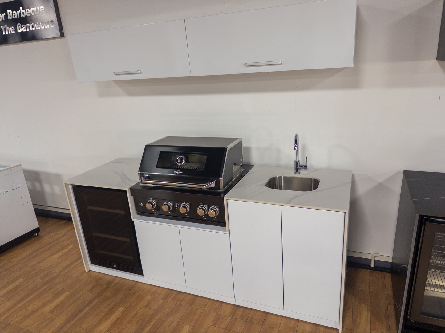 Grill King Signature Series Outdoor BBQ Kitchen Package – Rockpool White Stone Bench-Top, White Aluminium Cabinets | 4-Burner Built-In BBQ + Rotisserie + 150L Outdoor Fridge
