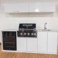 Grill King Signature Series Outdoor BBQ Kitchen Package – Rockpool White Stone Bench-Top, White Aluminium Cabinets | 4-Burner Built-In BBQ + Rotisserie + 150L Outdoor Fridge