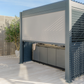 Grill King Outdoor BBQ Shelter Package – 6 Burner Charcoal BBQ Kitchen, Fridge & Sink + Freestanding Aluminium Louver Roof with LED Lighting & Privacy Blind