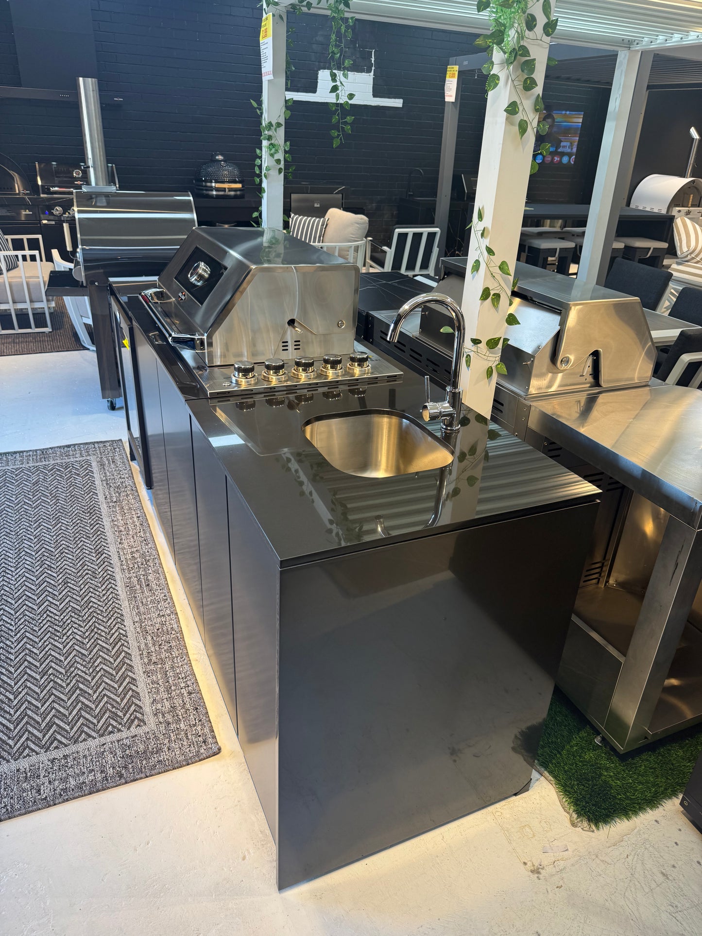 Grill King Signature Series Outdoor BBQ Kitchen Package – Rockpool Black Stone Bench-Top, Black Aluminium Cabinets | 4-Burner Built-In BBQ + Rotisserie + 150L Outdoor Fridge