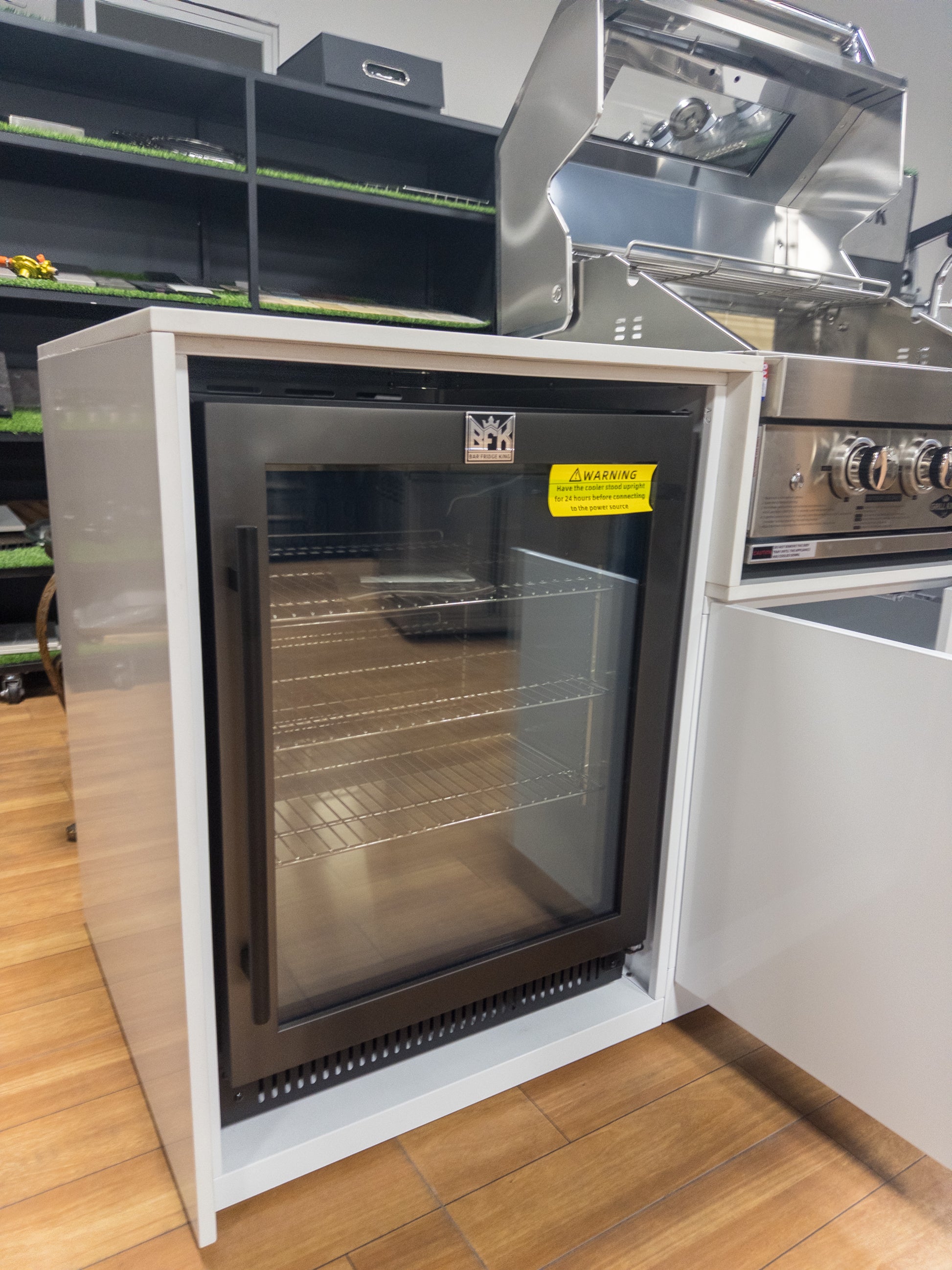 Grill King Signature Series Outdoor BBQ Kitchen Package – Rockpool White Stone Bench-Top, White Aluminium Cabinets | 4-Burner Built-In BBQ + Rotisserie + 150L Outdoor Fridge
