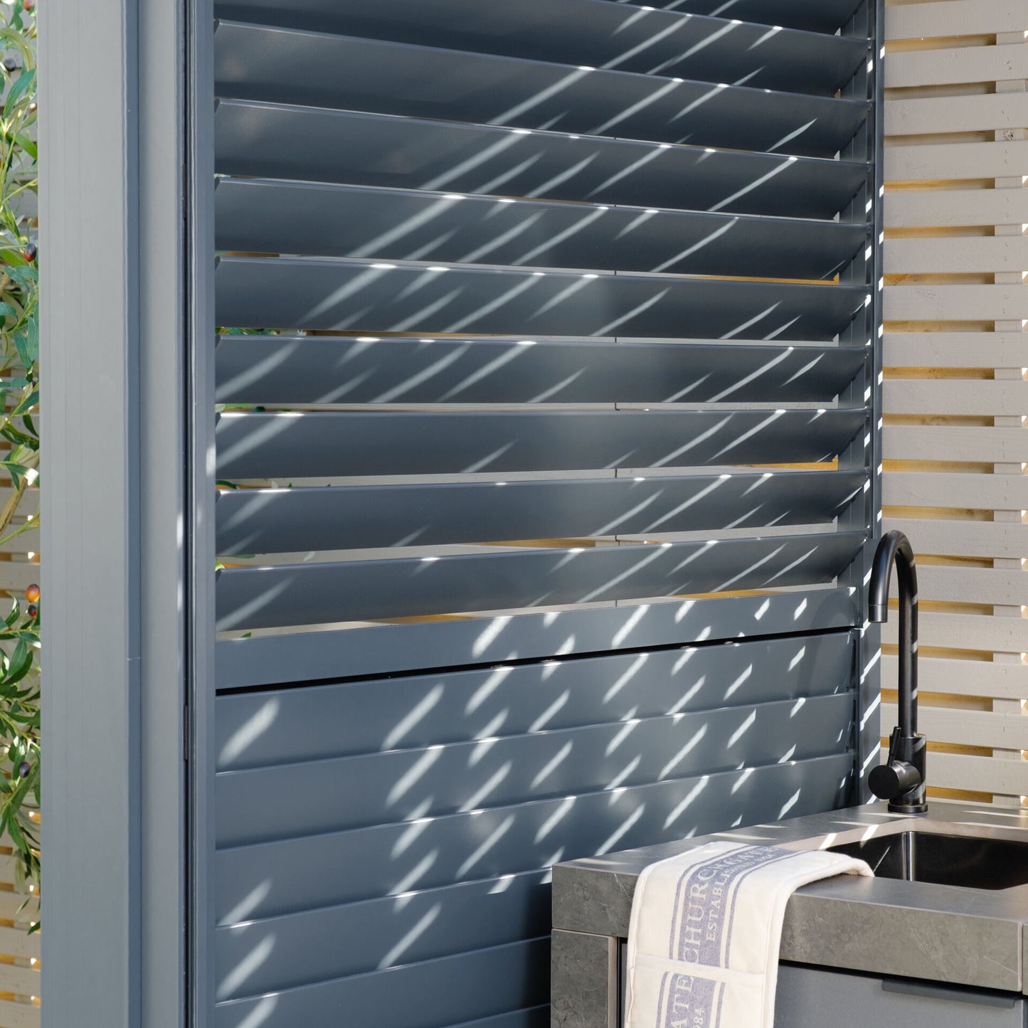 Grill King Outdoor BBQ Shelter Package – 6 Burner Charcoal BBQ Kitchen, Fridge & Sink + Freestanding Aluminium Louver Roof with LED Lighting & Privacy Blind