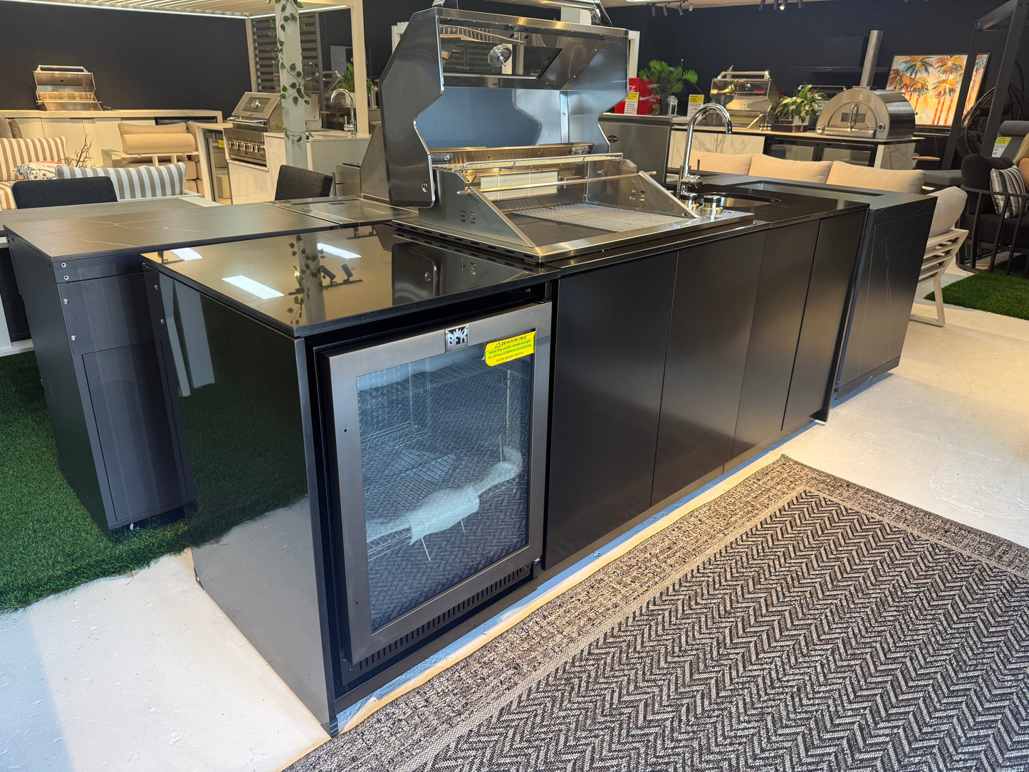 Grill King Signature Series Outdoor BBQ Kitchen Package – Rockpool Black Stone Bench-Top, Black Aluminium Cabinets | 4-Burner Built-In BBQ + Rotisserie + 150L Outdoor Fridge